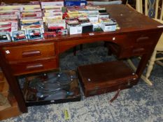 A 1940S OAK FOUR DRAWER DESK ON SQUARE LEGS. W 133 x D 72 x H 766cms.