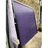 A HORMAN STEEL GARAGE DOOR, CANOPY STYLE, COMPLETE WITH FRAME IN WORKING ORDER. H 210CMS W 210CMS