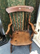 AN OAK KITCHEN ELBOW CHAIR, A TEXTILE COVERED FOUR FOLD SCREEN AND A BLACK AND GILT FLUTED COLUMN