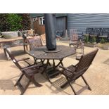 A TEAK GARDEN TABLE WITH PARASOL AND FOUR MATCHING CHAIRS.