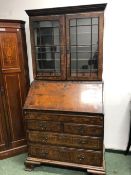 AN 18th C. WALNUT BUREAU BOOKCASE. 201 X 96 X 58cms.