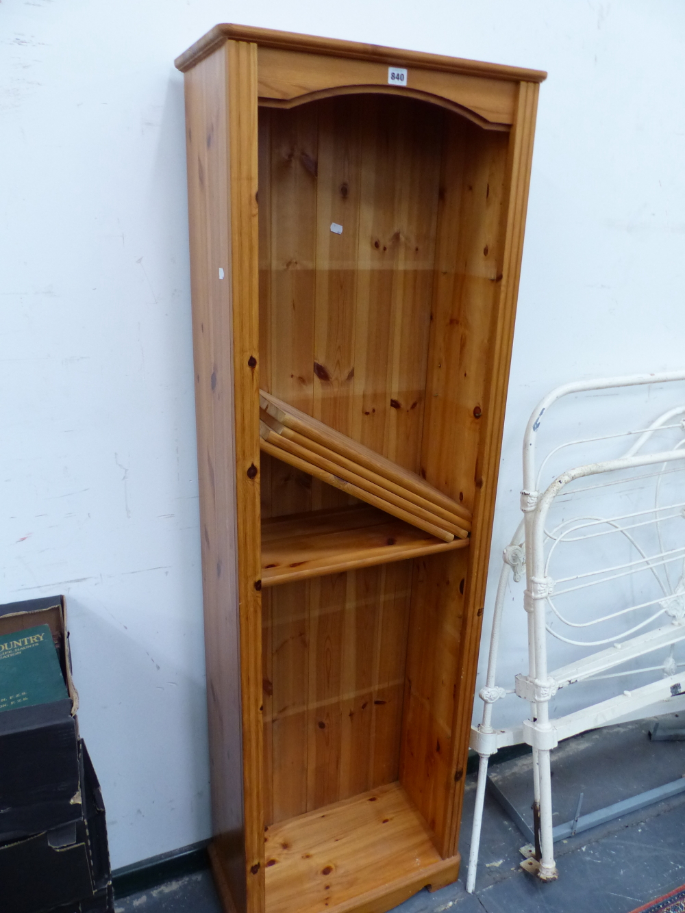 A PINE OPEN BOOKCASE WITH FIVE ADJUSTABLE SHELVES. W 55 x D 28 x H 176cms.