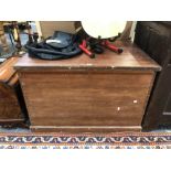 A FOUR HANDLED TEAK TRUNK WITH INTERIOR TRAY. W 99 x D 66 x H 66cms.