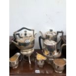 A COLLECTION OF ELECTROPLATE, COMPRISING THREE OF COFFEE POTS, MILK JUGS AND TWO HANDLED SUGAR BOWLS