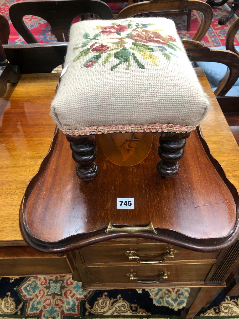 A FOOTSTOOL WITH A NEEDLE WORK SEAT TOGETHER WITH A TWO HANDLED MAHOGANY TRAY