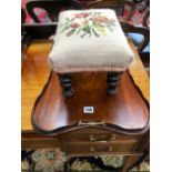 A FOOTSTOOL WITH A NEEDLE WORK SEAT TOGETHER WITH A TWO HANDLED MAHOGANY TRAY