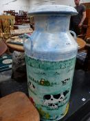 A TWO HANDLED MILK CHURN PAINTED WITH GRAZING COWS AND CALVES AND RED POPPIES