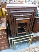 A NEST OF FOUR CHINESE CARVED HARDWOOD TABLES TOGETHER WITH ANOTHER SET OF THREE WITH BRASS SUPPORTS