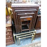 A NEST OF FOUR CHINESE CARVED HARDWOOD TABLES TOGETHER WITH ANOTHER SET OF THREE WITH BRASS SUPPORTS