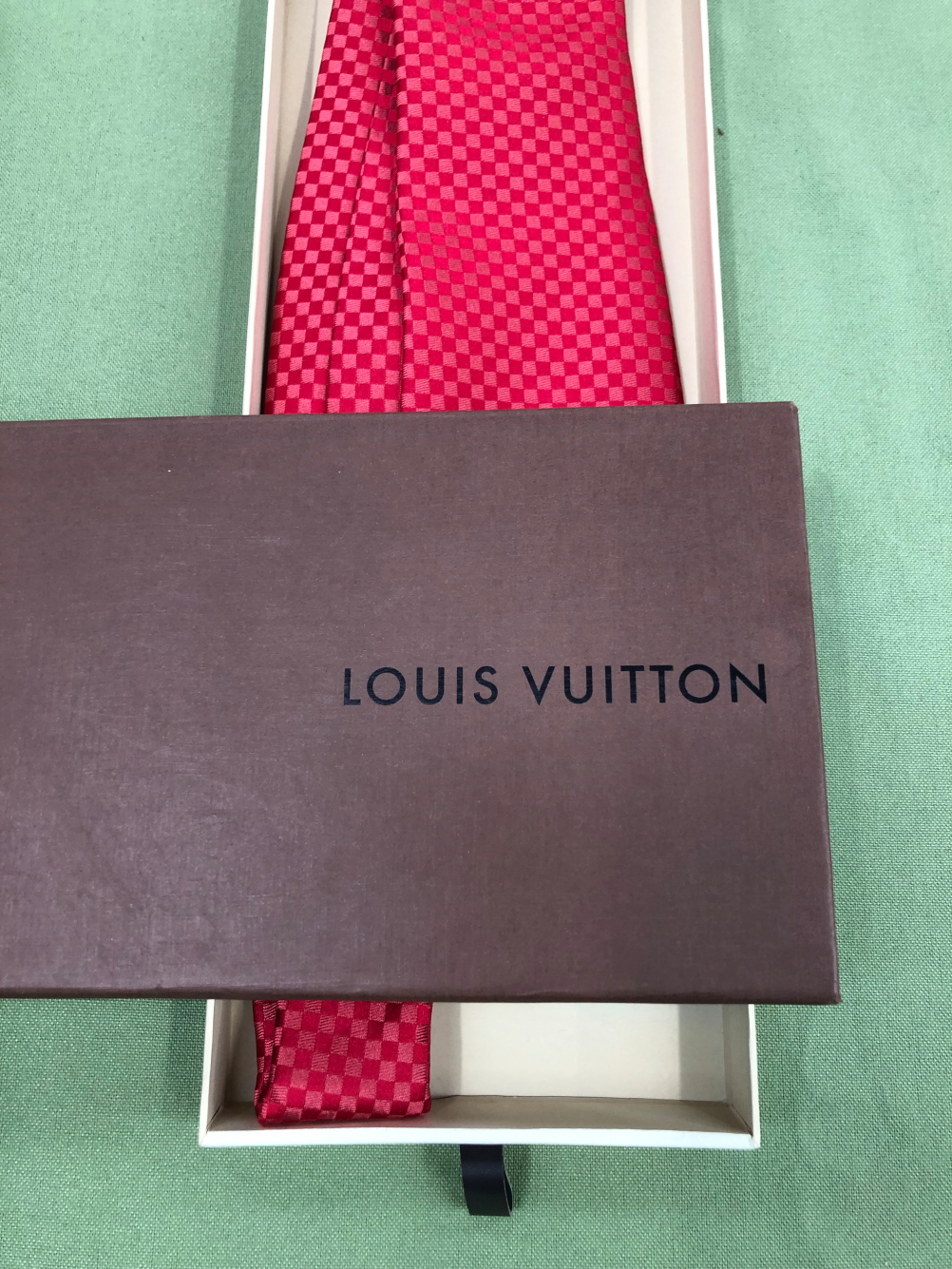 A LOUIS VUITTON RED SILK TIE. - Image 4 of 4