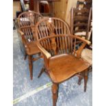A PAIR OF LOW BACKED WINDSOR CHAIRS WITH CRINOLINE STRETCHERS