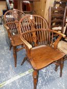 A PAIR OF LOW BACKED WINDSOR CHAIRS WITH CRINOLINE STRETCHERS