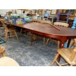 A 20th C. SCANDINAVIAN TEAK D-END DINING TABLE WITH TWO LEAVES. W 250 x D 120 x H 73cms.