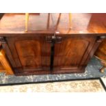 A PAIR OF VICTORIAN MAHOGANY BEDSIDE CUPBOARDS WITH SCROLL TOPPED PILASTERS FLANKING THE ROUND