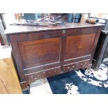 AN 18th C. OAK MULE CHEST, THE TWO PANEL FRONT BANDED IN MAHOGANY ABOVE TWO DRAWERS AND BRACKET