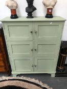 A GREEN PAINTED PINE CABINET OF THREE BANKS OF THREE CUPBOARDS ON BRACKET FEET. W 93 x D 32 x H