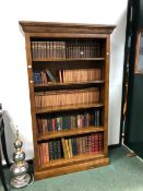 A BESPOKE OPEN FRONT OAK BOOKCASE. 188 X 112 X 40cms.