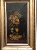 E. STEELE (19th/20th C.) A TABLE TOP STILL LIFE OF FRUIT, SIGNED, OIL ON CANVAS. 62 x 31cms