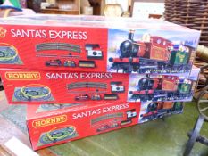 THREE HORNBY OO GAUGE SANTA'S EXPRESS TRAIN SETS.