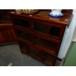 A LATE VICTORIAN MAHOGANY BOOKCASE, THE TOP TWO SHELVES ENCLOSED BY PAIRS OF GLAZED DOORS, THE