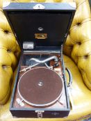 AN HMV 101 PORTABLE WIND UP GRAMOPHONE IN A BLACK CASE