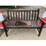 A TEAK GARDEN BENCH. W 122cms