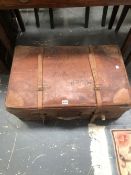 A LEATHER TRUNK. W 71 x D 43cms