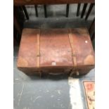 A LEATHER TRUNK. W 71 x D 43cms