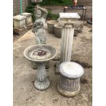 TWO COMPOSITE PEDESTALS, A LARGE CLASSICAL STYLE GARDEN FIGURE OF A LADY AND A BIRD BATH