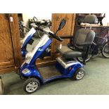 A KYMCO MOBILITY SCOOTER.