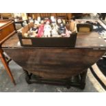 AN 18th C. OAK OVAL DROP FLAP TABLE WITH A DRAWER TO ONE END, THE TURNED LEGS JOINED BY STRETCHERS