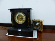 A BLACK SLATE CASED TIMEPIECE, TOGETHER WITH A BATTERY OPERATED CLOCK