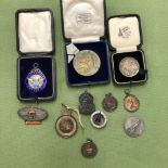 A COLLECTION OF VINTAGE MOTORING AND OTHER BADGES AND MEDALLIONS.