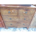 A 19th C. MAHOGANY CHEST OF TWO SHORT AND TWO GRADED LONG DRAWERS ABOVE A ROUNDED APRON RUNNING INTO