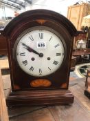 A MARQUETRIED MAHOGANY MANTEL CLOCK STRIKING ON A COILED ROD TOGETHER WITH A WALL CLOCK WITH A