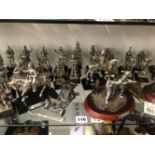 A COLLECTION OF ENGLISH MINIATURE SILVER PLATED SOLDIERS FROM VARIOUS NAMED REGIMENTS AND IN VARIOUS