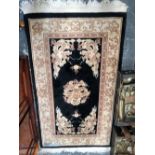 TWO CHINESE RUNNERS AND A SIMILAR SMALL RUG. RUNNERS 330 x 77cms (3)