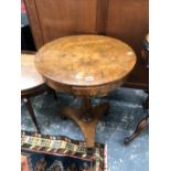 A 19th C. WALNUT TABLE, THE CIRCULAR TOP WITH TWO REAL AND TWO FALSE DRAWERS AND ROTATING ON A