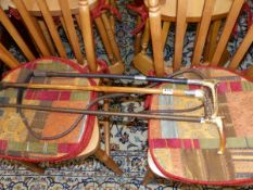 THREE ANTIQUE SILVER MOUNTED RIDING CROPS AND WHIPS.