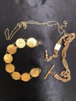 A ORIENTAL DISC BRACELET UNHALLMARKED ASSESSED AS GOLD TOGETHER WITH A VINTAGE FOB CHAIN AND A