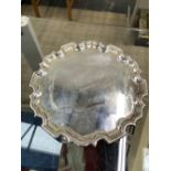 A SMALL HALLMARKED SILVER WAITER TRAY. 344grams