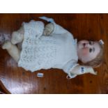 A SIMON AND HALBIG 126 BISQUE HEADED DOLL
