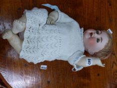 A SIMON AND HALBIG 126 BISQUE HEADED DOLL