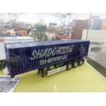FIVE TAMIYA SEMI TRAILERS FOR A REMOTE CONTROL TRUCK, EACH ADVERTISING SHADOWSIDE