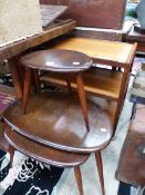 A NEST OF THREE ERCOL TABLES TOGETHER WITH A 1970S TEAK THREE TIER TROLLEY