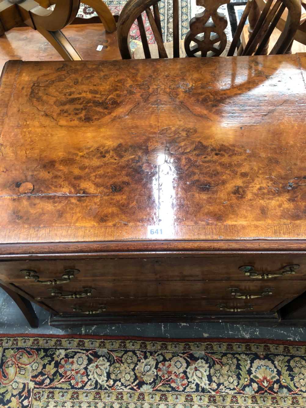 A VICTORIAN CROSS BANDED BURR WALNUT CHEST OF THREE LONG DRAWERS ON BRACKET FEET, THE TOP QUARTER - Image 2 of 2