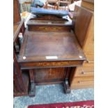 A LATE VICTORIAN MARQUETRIED ROSEWOOD DAVENPORT DESK