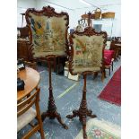 A PAIR OF VICTORIAN WALNUT POLE SCREENS, THE SCROLL RECTANGULAR FRAMED BANNERS WITH BIRD AND