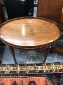 AN 18th C. CROSS BANDED MAHOGANY BUTLERS TRAY MOUNTED AS A COFFEE TABLE ON SQUARE SECTIONED LEGS