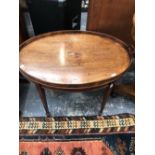 AN 18th C. CROSS BANDED MAHOGANY BUTLERS TRAY MOUNTED AS A COFFEE TABLE ON SQUARE SECTIONED LEGS